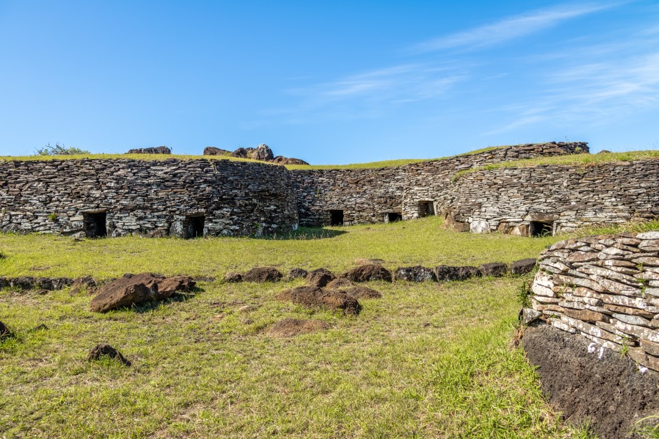 Brick houses at the ruins of Orongo Village at Rano Kau Volcano - Easter Island, Chile