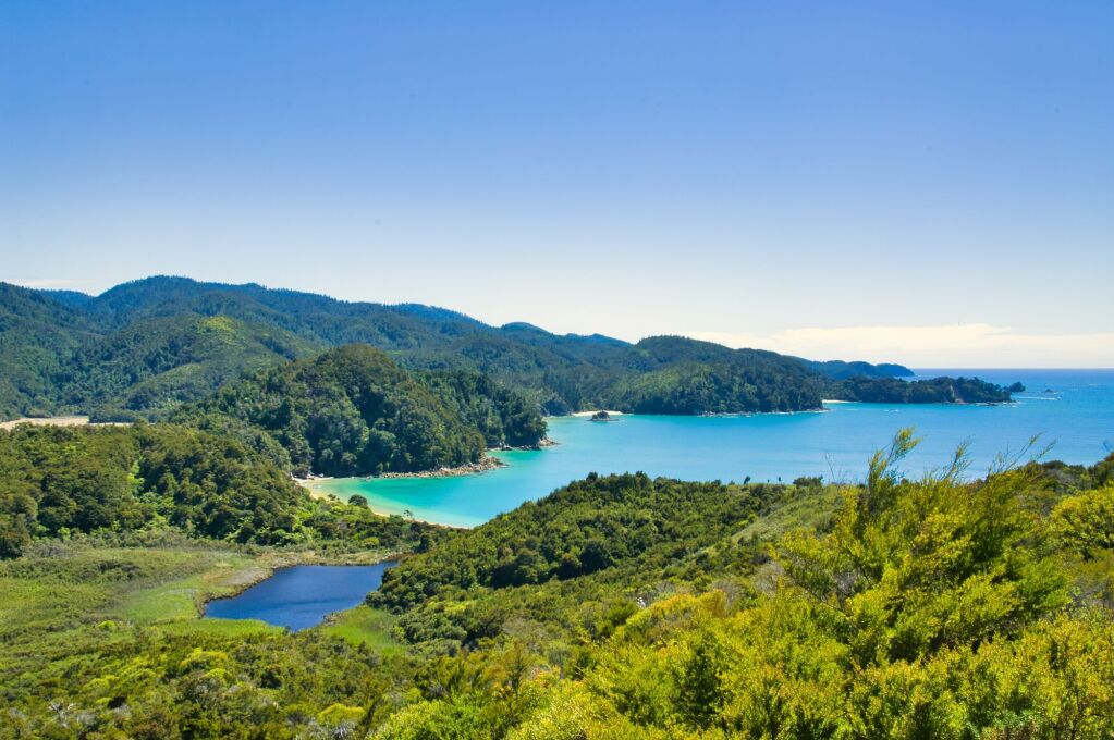 View of the coast of Abel Tasman National Park, South Island, New Zealand. from the Abel Tasman Coast Track between Marahau and the bay The Anchorage.

